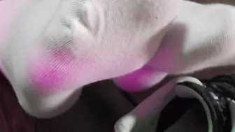 Warm-up inside Sneakers and White Socks Showing Off
