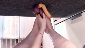 Jerking penis with goddess legs on the milking board