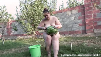 nude bbw walks inside the garden with candy into the