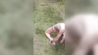 Nude Tourtist Plays with her Cunt into a Forrest