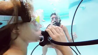 Katya Nakolkina with another women inside the Pool