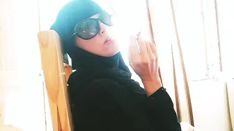 Cutie Arab Fiance inside Hijab Smoking with Satisfaction