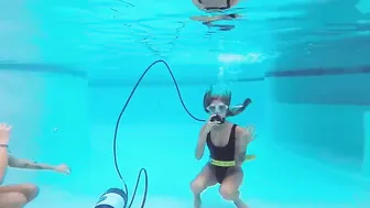 Katya Nakolkina with another chick inside the pool