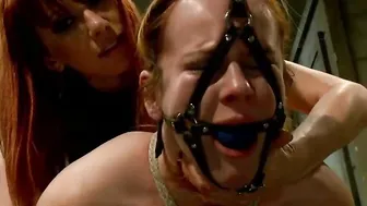 Bushy lesbo slave whipped and spanked