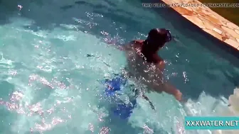 Cutie dark hair bimbo Candy swims underwater