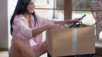 Cutie dark haired spanks her bare cunt and butt with a ride crop