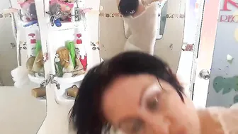 Striptease dancing into shower room. one-6