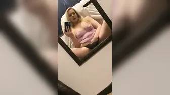 Masturbating inside front of a mirror