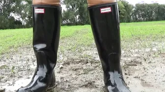 Muddy walking inside wellies and handcuffs