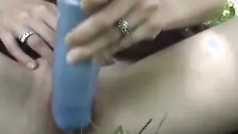 Young red haired with huge breasts dildoing her cunt public