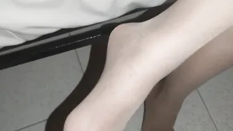 She slips on her pantyhose and waits for the cum on her toes 