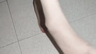 She slips on her pantyhose and waits for the cum on her toes 