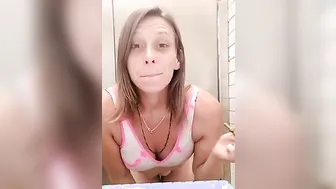 Basically nude smoking inside the Walmart WC
