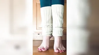 beauty milf inside jeans with legwarmers takes slippers off