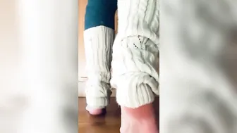 beauty milf inside jeans with legwarmers takes slippers off