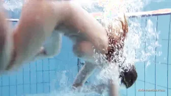 Zuzanna swims nude and turned on inside the pool