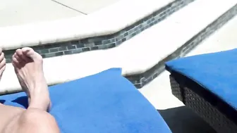 Stepbrother rubbing stepsisters back with some lotion