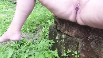 Long pissing sitting outdoor
