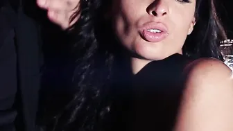 Gang Bang with a big boobed dark haired inside a parking