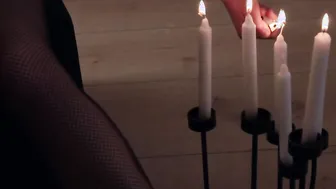 Dark Hair Bae into ebony tights fucks her twat with a candle