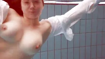 Huge boobies ginger Lola underwater naked
