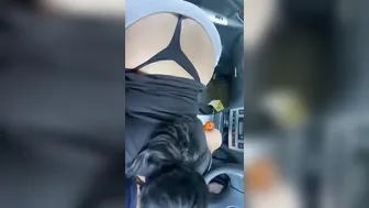 Hispanic Mom giving sloppy gobby into the vehicle