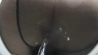 Pissing into tights on secret camera