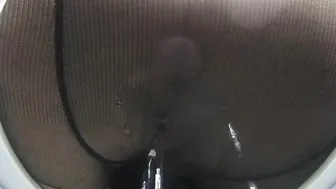 Pissing into tights on secret camera