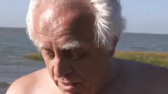 Mature and young turned on lovers fucking at the beach