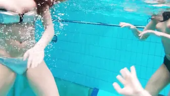 Avenna with Nina Mohnatka and Marketa swimming inside the pool