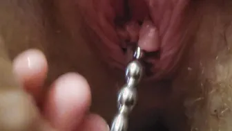 Sounding her piss hole and my penis with the a shared rod