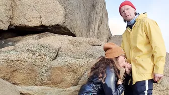 Missus inside shiny raincoat giving hand job and fellatio to stranger wearing raincoat