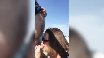 BBW blowing penis at the beach