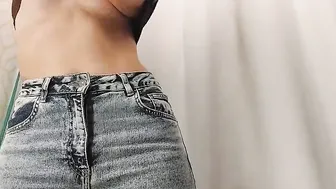 Young bimbos inside the fitting room of the store