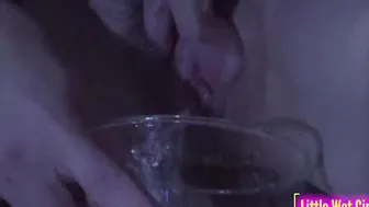 Peeing in a vase at the bar table during a