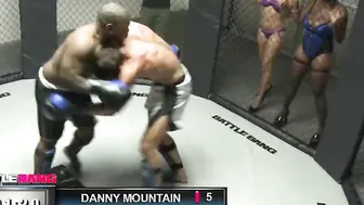 Dark Haired bimbo with gigantic melons fucking a boxer into the