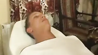 Blonde MILF shoves penis into her booty on a table
