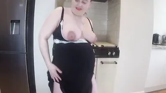 Pregnant showing off baby belly into minidress