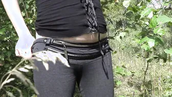 Peeing into the forest old MILF with a huge bush on her snatch.