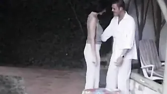 Vulgar dark hair doing double penetration public