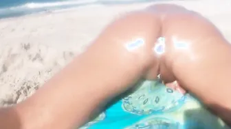 Cutie mom totally nude oiled stretched wide open with a plugged asshole on naked beach masturbating