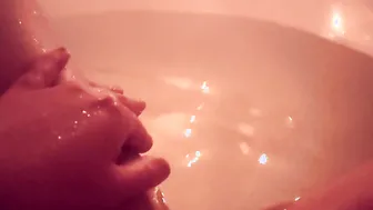 Wifey bathes inside the toilet by candlelight washes herself and rubs her snatch