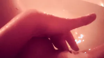 Wifey bathes inside the toilet by candlelight washes herself and rubs her snatch