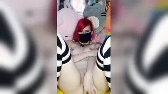 Red haired hoe fucks her booty with glass plug