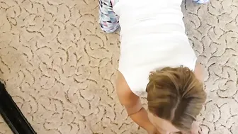 The slutty b. dances into front of the dude and then blows his penis and swallows sperm