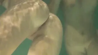 Russian dyke girls swimming inside the pool