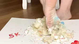 Crushing cake with toes