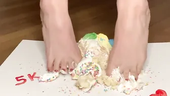 Crushing cake with toes