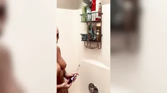 beauty blonde MILF has a steamy shower using a sex toy so she can cum for all to view