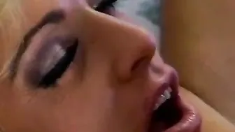 Blonde mulf blows down a gigantic penis on her knees